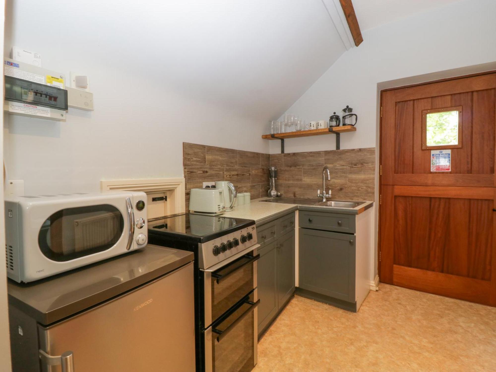 The Coach House Apartment Тьюксбери Экстерьер фото